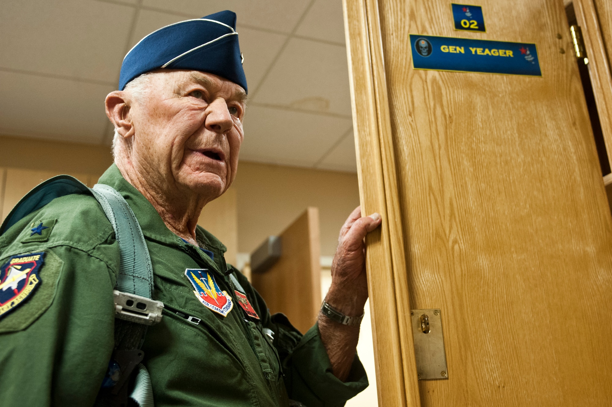 Retired United States Air Force Brig. Gen. Charles E. "Chuck" Yeager suits up at the 65th Aggressor Squadron before his flight Oct. 14, 2012, at Nellis Air Force Base, Nev. Yeager, the first pilot to break the sound barrier,and is commemorating the 65th anniversary of his historic flight by flying in an F-15D Eagle. (U.S. Air Force photo by Airman 1st Class Jason Couillard)