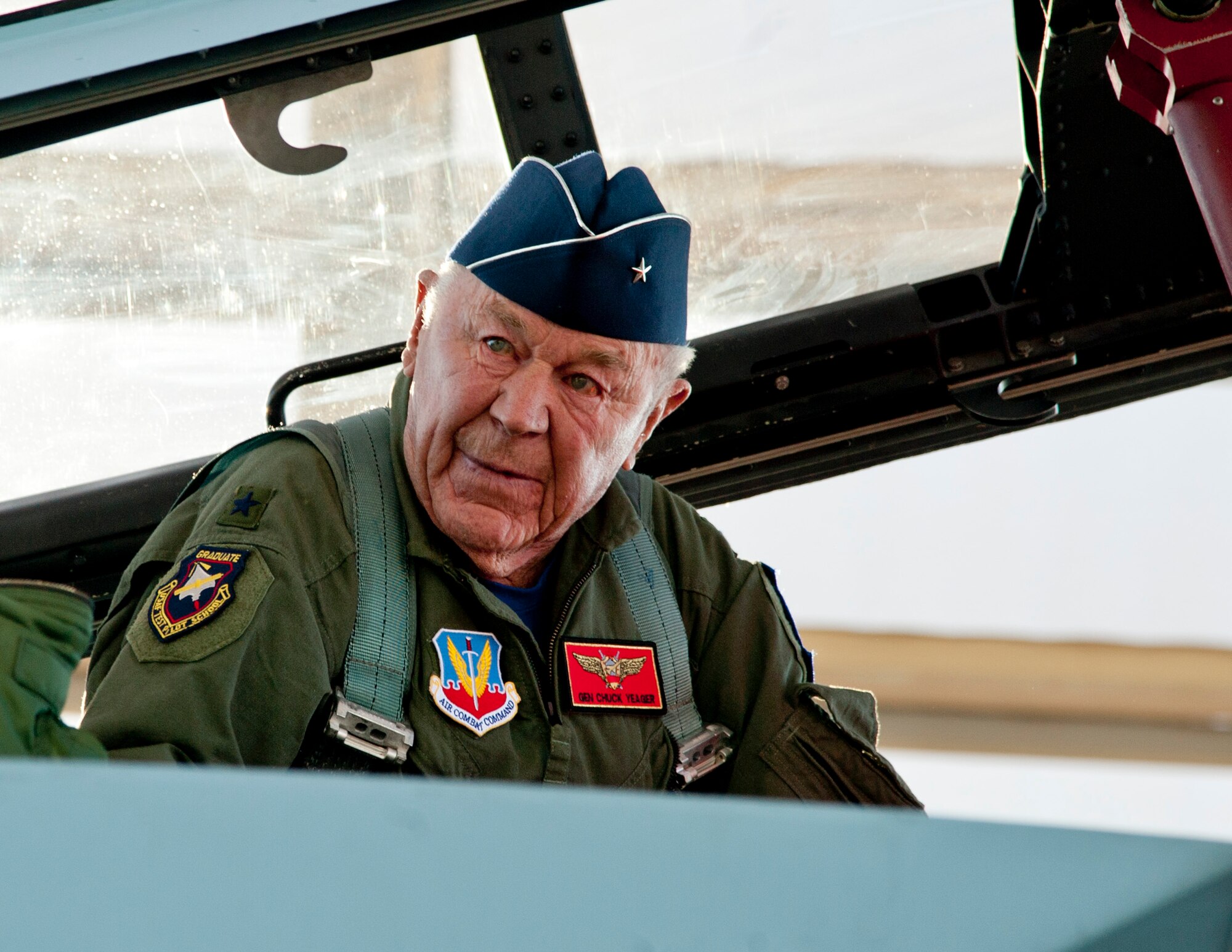 Retired United States Air Force Brig. Gen. Charles E. "Chuck" Yeager settles into the back seat of an F-15D Eagle from the 65th Aggressor Squadron Oct. 14, 2012, at Nellis Air Force Base, Nev. In a jet piloted by Capt. David Vincent, 65th AGRS pilot, Yeager is commemorating the 65th anniversary of his historic breaking of the sound barrier flight. Yeager flew eight flights in the Bell X-1 rocket research plane before becoming the first pilot to break the sound barrier Oct. 14, 1947. (U.S. Air Force photo by Master Sgt. Jason W. Edwards)

