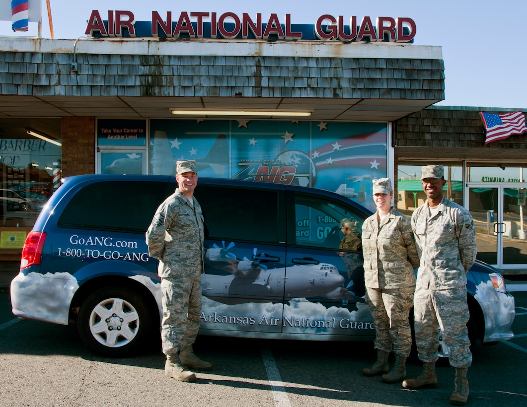 Arkansas Air National Guard recruiters hit record highs in recruiting this year bringing end strength up to 101 percent. Standing in front of their ANG recruiting van and storefront located in Jacksonville, Ark. (l to r) are Master Sgt. Tro...y Grooms, Recruiting Office Supervisor, 189th Airlift Wing, recruiting office number 501-987-8056, Technical Sgt. Katie Higginbotham, Recruiter, accessioned 74 applicants, recruiter's number 501-352-5968 and Senior Airman Gregory Burks, Jr., Recruiter, accessioned 64 applicants, recruiter's number 501-786-4193. The Arkansas Air National Guard recruiters look for the best qualified candidates to serve in America’s Air National Guard. 
Air National Guard photo by Master Sgt. Dianna Seerey