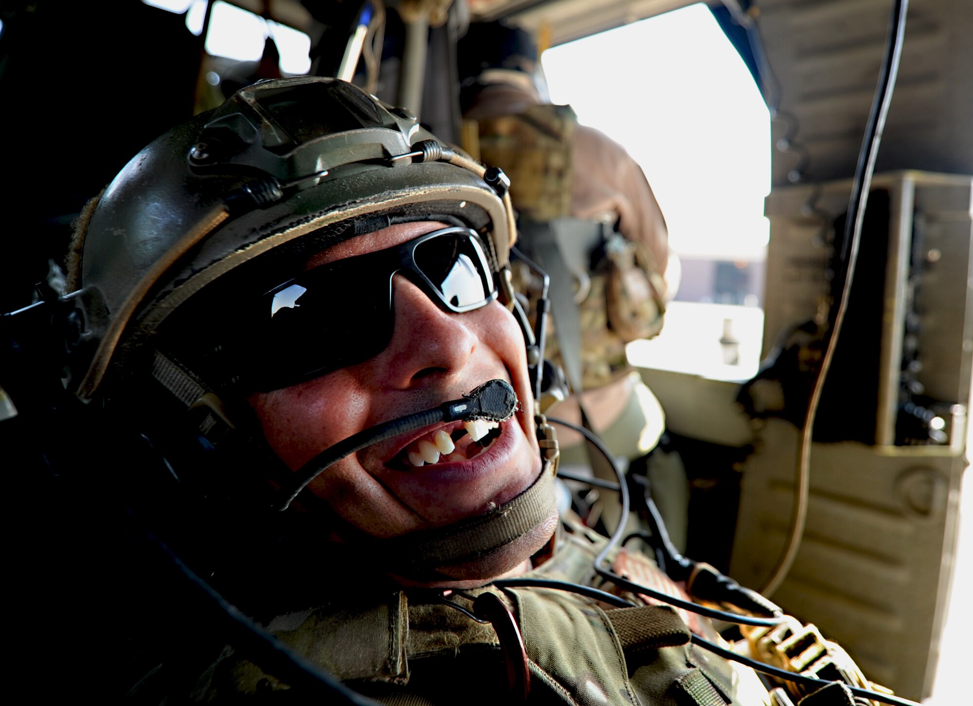 Staff Sgt. Dean Criswell, a 31st Rescue Squadron pararescumen, shows his excitement after performing alternate insertions and extractions from a 33rd Rescue Squadron HH-60 Pave Hawk during a combat search and rescue training scenario for Pacific Thunder at Osan Air Base, Republic of Korea, Oct. 12, 2012. Pacific Thunder is an annual two-week exercise that links up 33rd and 31st Rescue Squadron Airmen with the 25th Fighter Squadron and other units at Osan AB, to test CSAR tactics to prepare for real-world emergencies. (U.S. Air Force photo/Staff Sgt. Sara Csurilla)