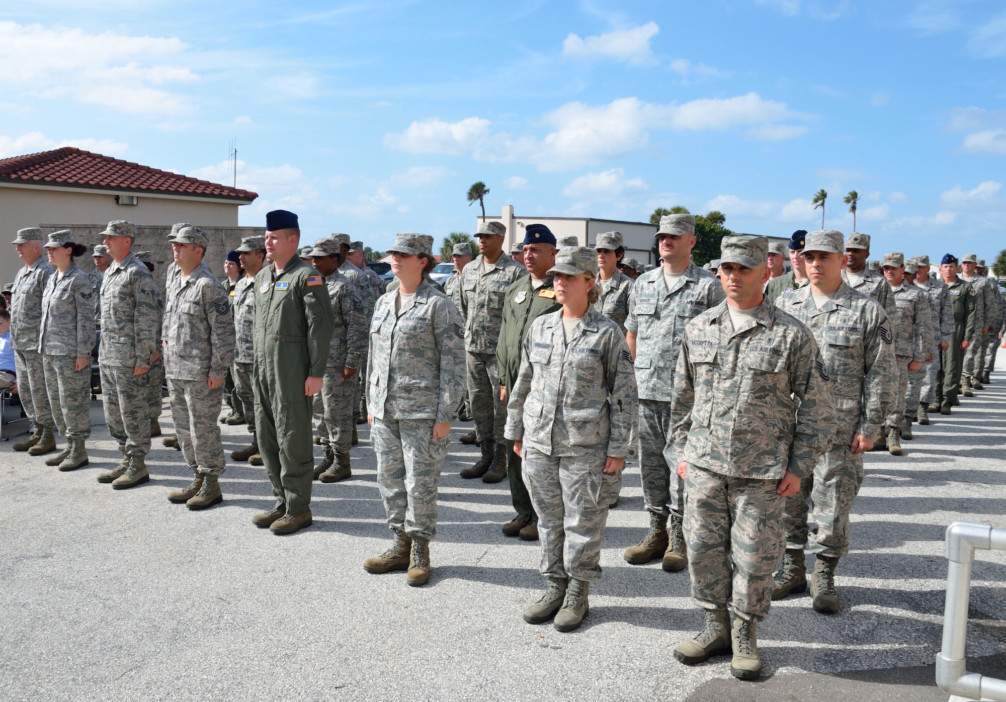 Members of the 920th Aeromedical Staging Squadron stand in formation during a memorial service for Maj. Kevin Wilkins Oct. 14, 2012 at Patrick Air Force Base, Fla. Wilkins was a critical care nurse with the 920th ASTS from 1996 to 2008 when he died from a brain tumor. (U.S. Air Force photo/Staff Sgt. Anna-Marie Wyant)