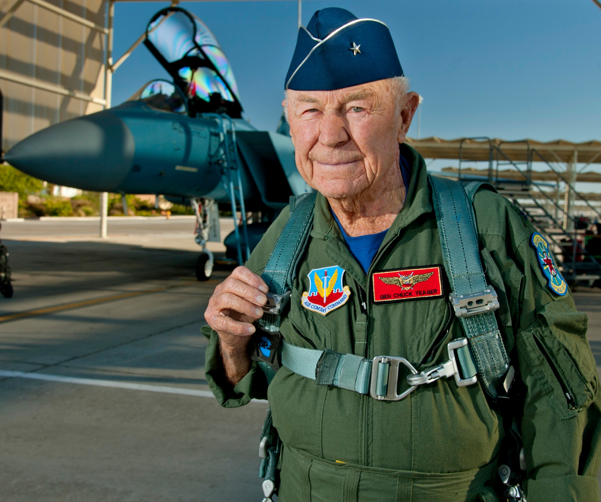 Retired United States Air Force Brig. Gen. Charles E. "Chuck" Yeager prepares to board an F-15D Eagle from the 65th Aggressor Squadron Oct. 14, 2012, at Nellis Air Force Base, Nev. In a jet piloted by Capt. David Vincent, 65th AGRS pilot, Yeager is commemorating the 65th anniversary of his historic breaking of the sound barrier flight Oct. 14, 1947, in the Bell X-1 rocket research plane named "Glamorous Glennis." Yeager was awarded the prestigious Collier Trophy in 1948 for this landmark aeronautical achievement. (U.S. Air Force photo by Master Sgt. Jason W. Edwards)
