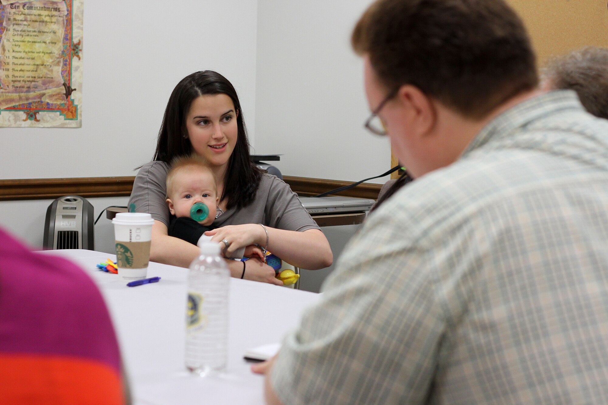 Holly Allen, wife of Airman 1st Class Justin Allen, speaks with Army Wives producers and writers during a focus group, Oct. 11, at Joint Base Lewis-McChord, Wash. The crew visits one military installation a year to gain insight into the life of Army wives. (U.S. Air Force photo/Kamryn Jaroszewski)