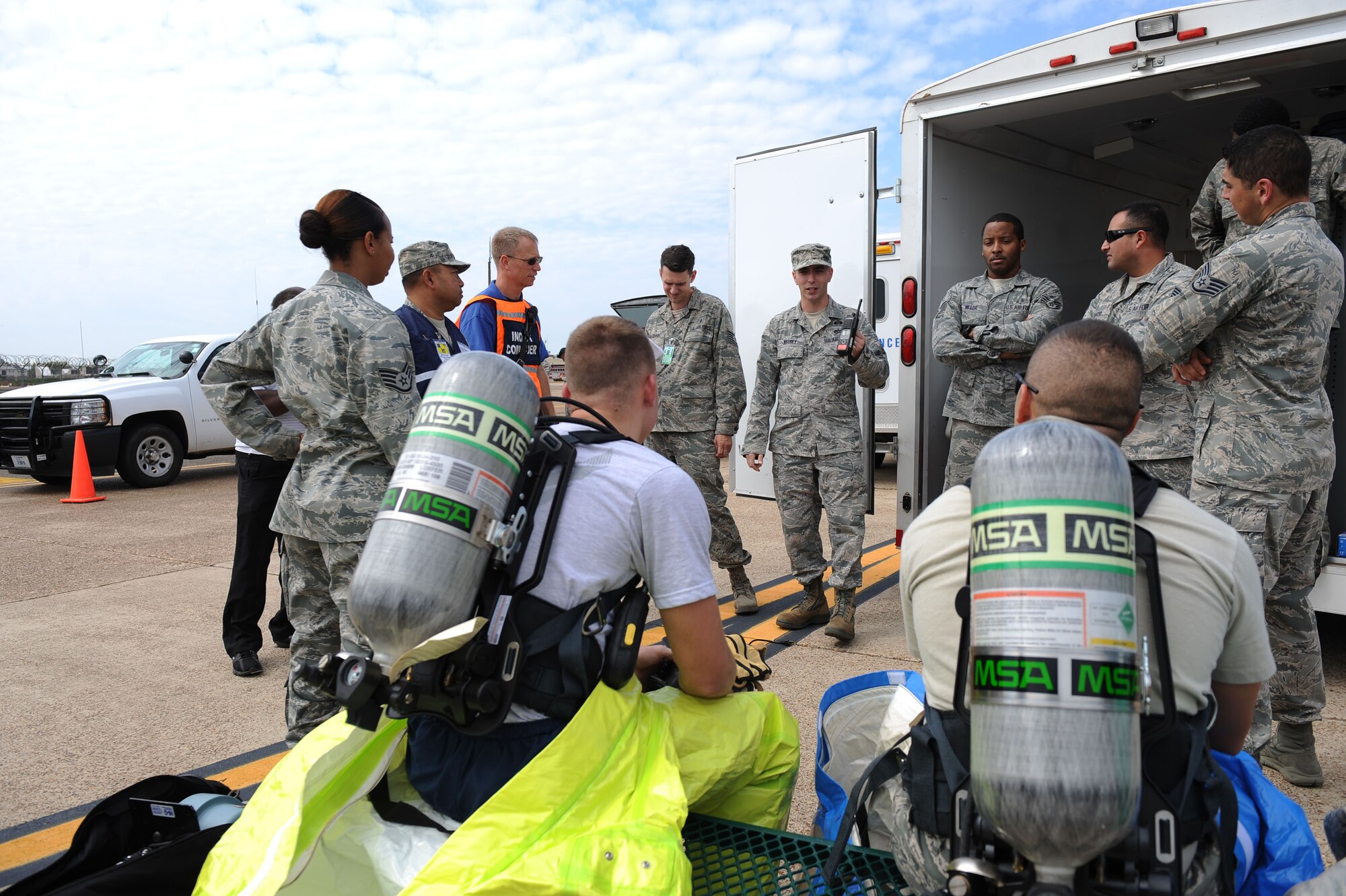 Emergency response Airmen listen to a safety briefing during a major accident response exercise on Barksdale Air Force Base, La., Oct. 12. During the briefing the Airmen discussed the plan of action, evacuation procedures and hand signals. (U.S. Air Force photo/ Senior Airman Micaiah Anthony)(RELEASED)