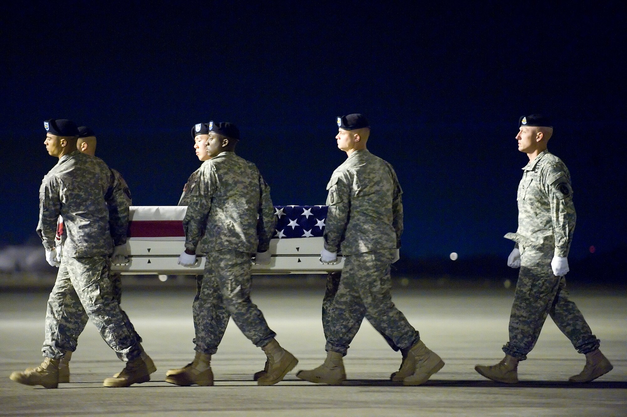 A U.S. Army carry team transfers the remains of Army Sgt. Robert J. Billings of Clarksvilla, Va., at Dover Air Force Base, Del., Oct. 15, 2012. Billings was assigned to the 5th Battalion, 20th Infantry Regiment, 3rd Stryker Brigade Combat Team, 2nd Infantry Division, Joint Base Lewis-McChord, Wash.  (U.S. Air Force photo/Adrian R. Rowan)