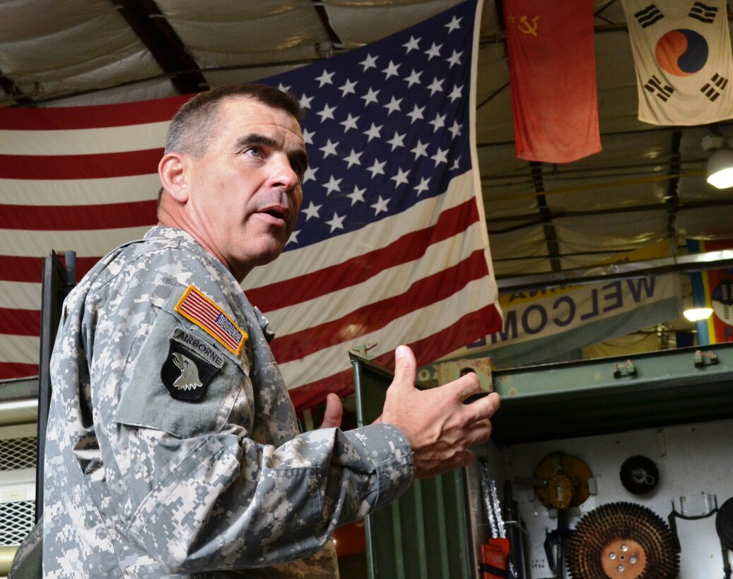 U.S. Army Brig. Gen. Jeffrey N. Colt, 18th Airborne Corps deputy commanding general, speaks to Soldiers from the 544th Dive Detachment, Special Troops Battalion, 7th Sustainment Brigade, Oct 3. Colt also toured the Atlas forklift, Kalmar, and watercraft simulation centers on base, and met with watercraft Soldiers while visiting 3rd Port. (U.S. Army photo by Sgt. Edwin Junior Rodriguez / Released)