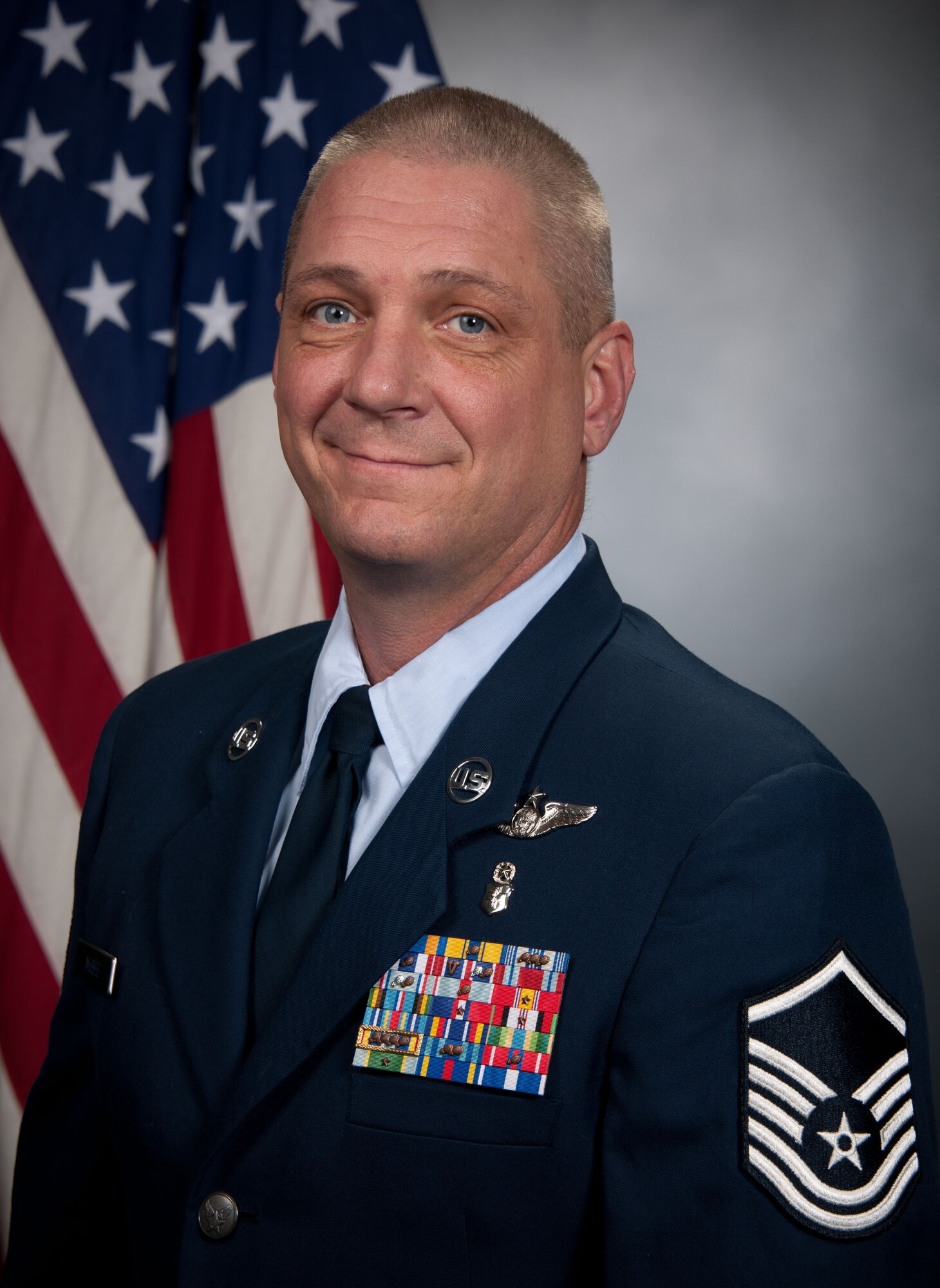 Master Sgt. Shannon McBee poses for his official photo after being nominated for the 2013 Noncommissioned Officer Association Vanguard Award. McBee saved a man's life while on a flight from Atlanta to San Antonio. (Submitted photo) 