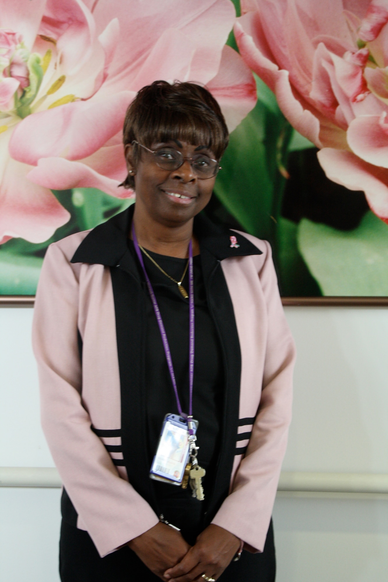 Proudly sporting her pink, Aloys Ingram is an 11-year survivor of breast cancer and is still going strong. She is the manager of Maxwell's Drug Demand Reduction Center and a volunteer cancer patient mentor at a local cancer center. (U.S. Air Force photo by Rebecca Burylo)
