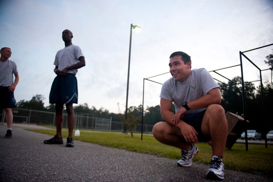U.S. Air Force Airman 1st Class Jonathan Kaiser, 820th Combat Operations Squadron combat arms, takes a break between repetitions during the annual LeeBernard Chavis Memorial Workout Oct. 15, 2012, at Moody Air Force Base, Ga. The workout is a tribute to Airman 1st Class LeeBernard Chavis, a defender assigned to Moody who was killed by an enemy sniper in 2006 while deployed to Baghdad. (U.S. Air Force photo by Staff Sgt. Jamal D. Sutter/Released) 
