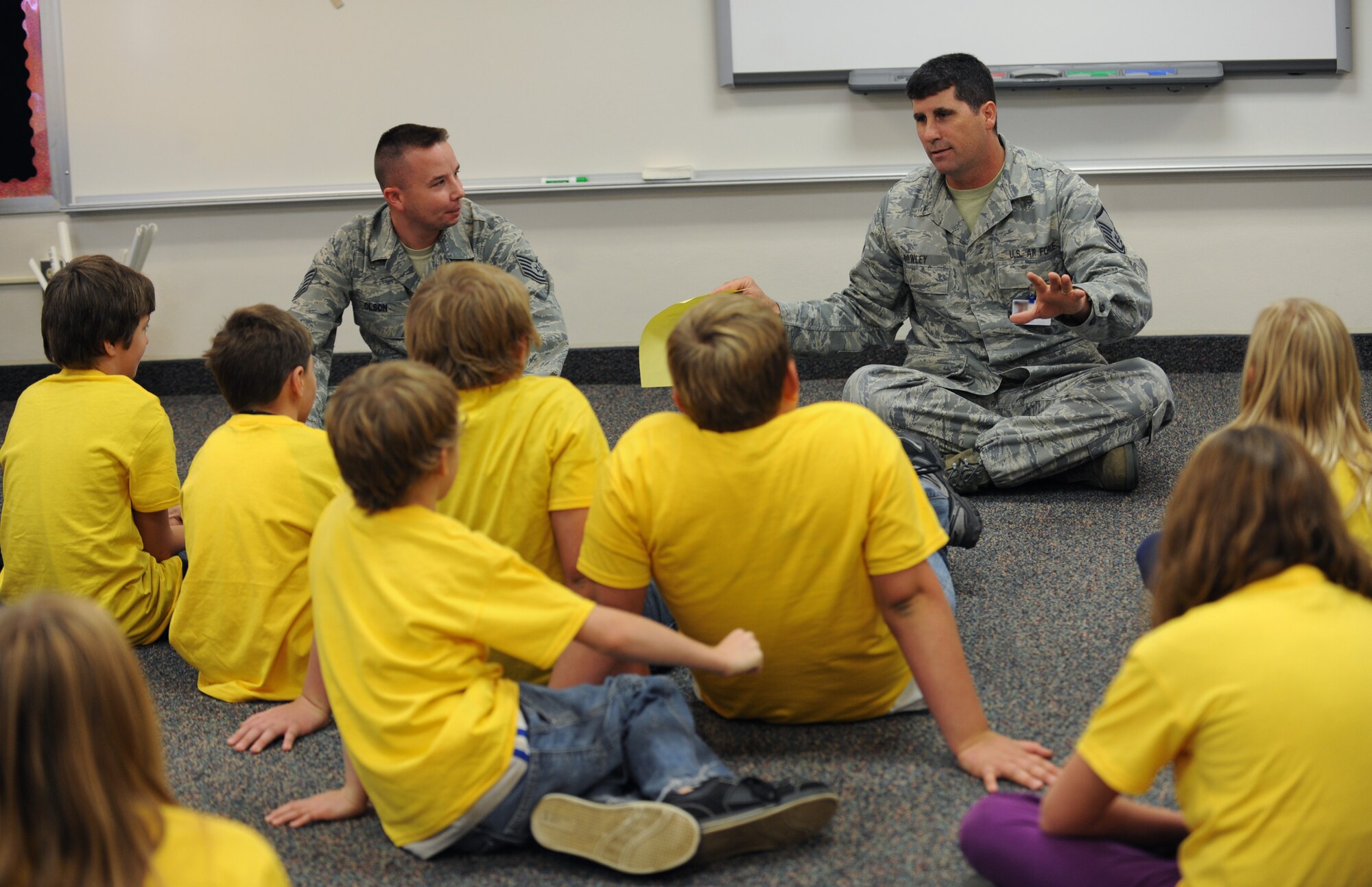 MINOT AIR FORCE BASE, N.D. -- Master Sgt. Matthew Bowley, 5th Force Support Squadron NCO in charge of the Airman and Family Readiness Center, speaks with fifth grade students from the STARBASE North Dakota program about what it means to be deployed, Oct. 11. As part of the program, students take part in Operation Global Freedom, an initiative that educates them on military deployments and gives them an opportunity to reach out to deployed members by mailing out care packages. (U.S. Air Force photo/Senior Airman Jose L. Hernandez) 