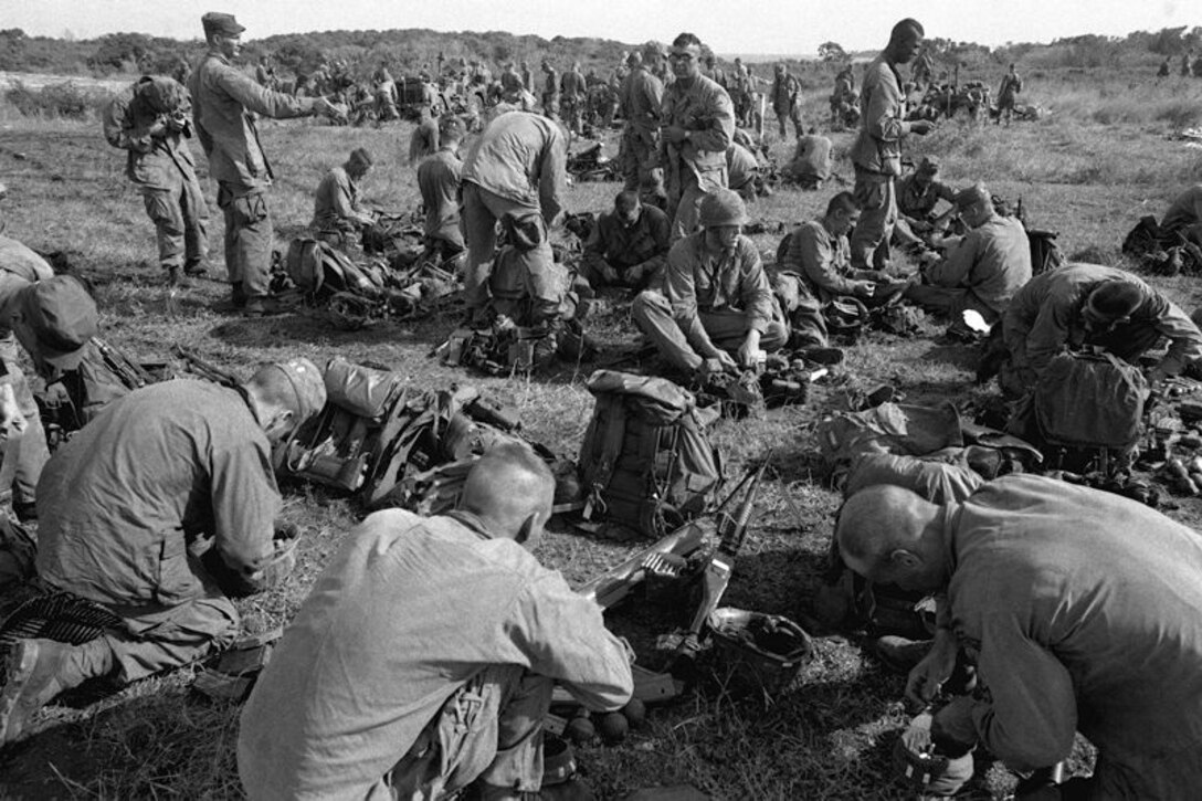 A group of U.S. Army Rangers gather their gear at Point Salines airfield during Operation Urgent Fury. In October 1983, 23rd Air Force participated in the seven-day operation that led to the successful rescue of Americans from Grenada. A 1st Special Operations Wing Combat Talon crew earned the Mackay Trophy and a Spectre crew earned the Lt. Gen. William H. Tunner Award for their efforts. (courtesy photo)