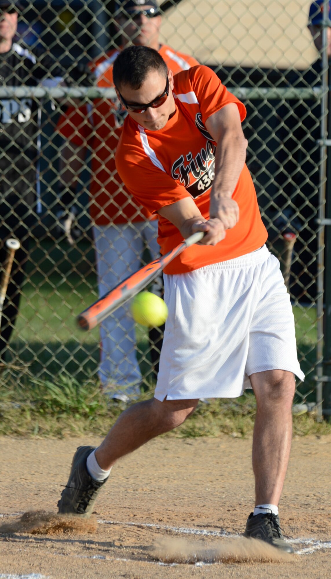 Casey Wheatley, 436th Security Forces Squadron left fielder, knocks a single during the Battle of the Badges softball game against the 436th Civil Engineer Squadron Fire Department Oct. 10, 2012, at the softball field on Dover Air Force Base, Del. Wheatley went 4-for-4 with a triple and three RBIs as the Cops whipped the Fire Dawgs 18-3. (U.S. Air Force photo by Tech. Sgt. Chuck Walker)