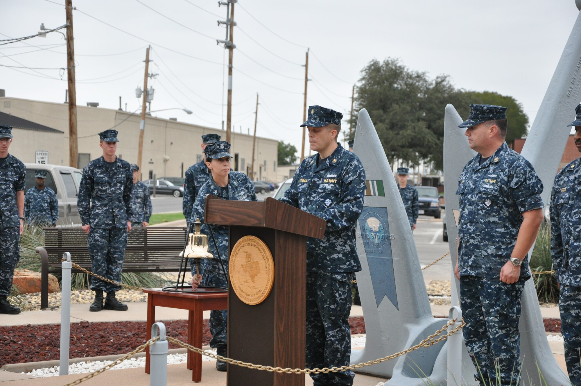 GOODFELLOW AIR FORCE BASE, Texas- Navy Petty Officer 1st Class Wendy Phillips, Center for Information Dominance Detachment cryptologist technician, rings the bell at the Navy-wide 9 a.m. bell ringing ceremony celebrating the U.S Navy’s 237th birthday on Oct. 12, here. The tradition of ringing the bell came from the Navy’s use of marking time with the bell; in the ceremony the bell was rung eight times to signify the end of the 237th watch and rung one more time to signify the start of the watch of the 238th year. (U.S. Air Force photo/ Airman 1st Class Erica Rodriguez)