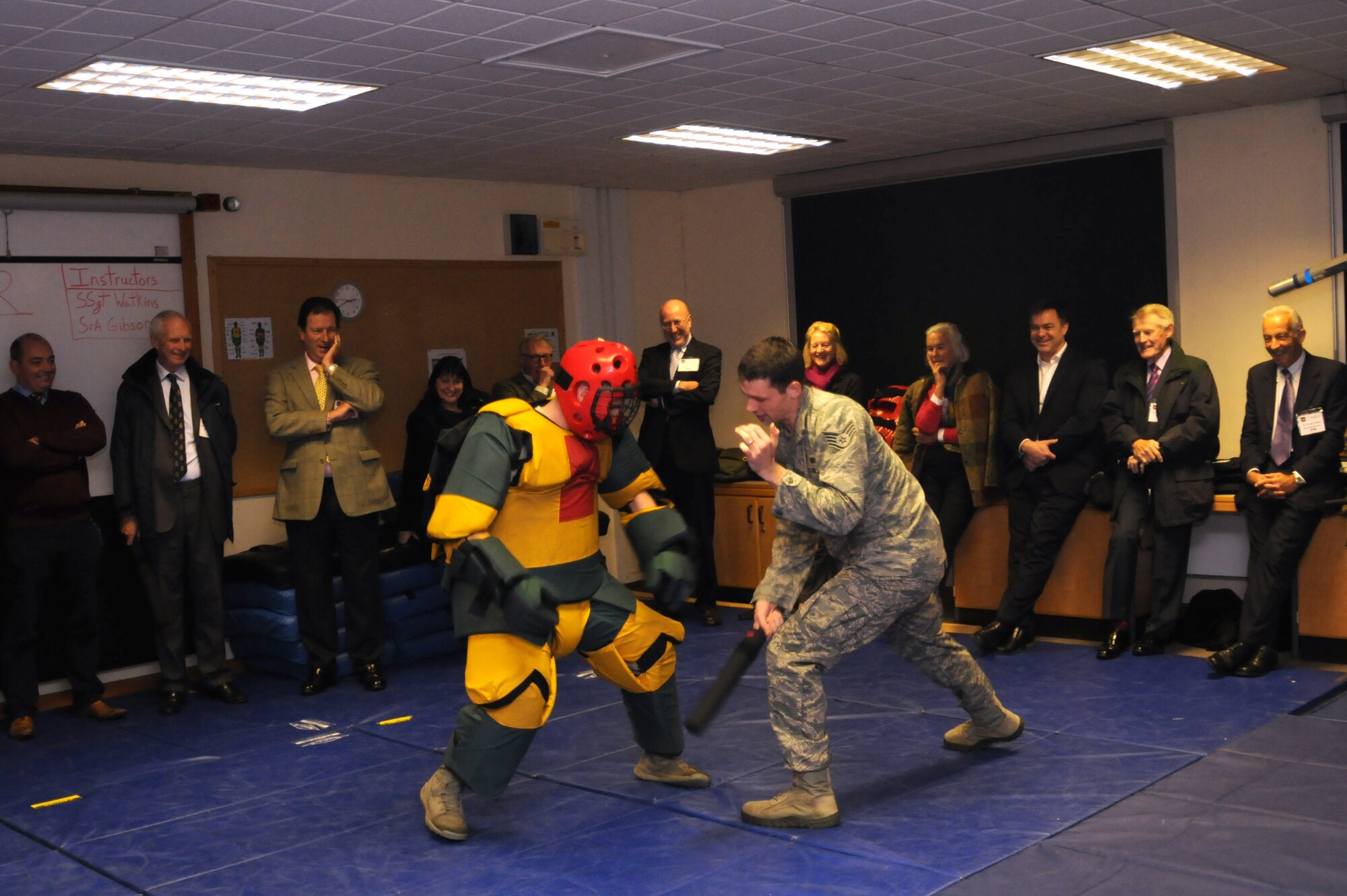 Airmen from the 48th Security Forces Squadron conduct a show of force demonstration for members of a tour group Oct. 12, 2012, at RAF Feltwell, England. The tour group was hosted by U.S. Air Forces in Europe - United Kingdom and consisted of the high sheriffs of several counties, their spouses and several other distinguished guests. The security forces portion of the tour also included weapons, military working dog and vehicle demonstrations. (U.S. Air Force photo by Tech. Sgt. Neal X. Joiner/Released) 