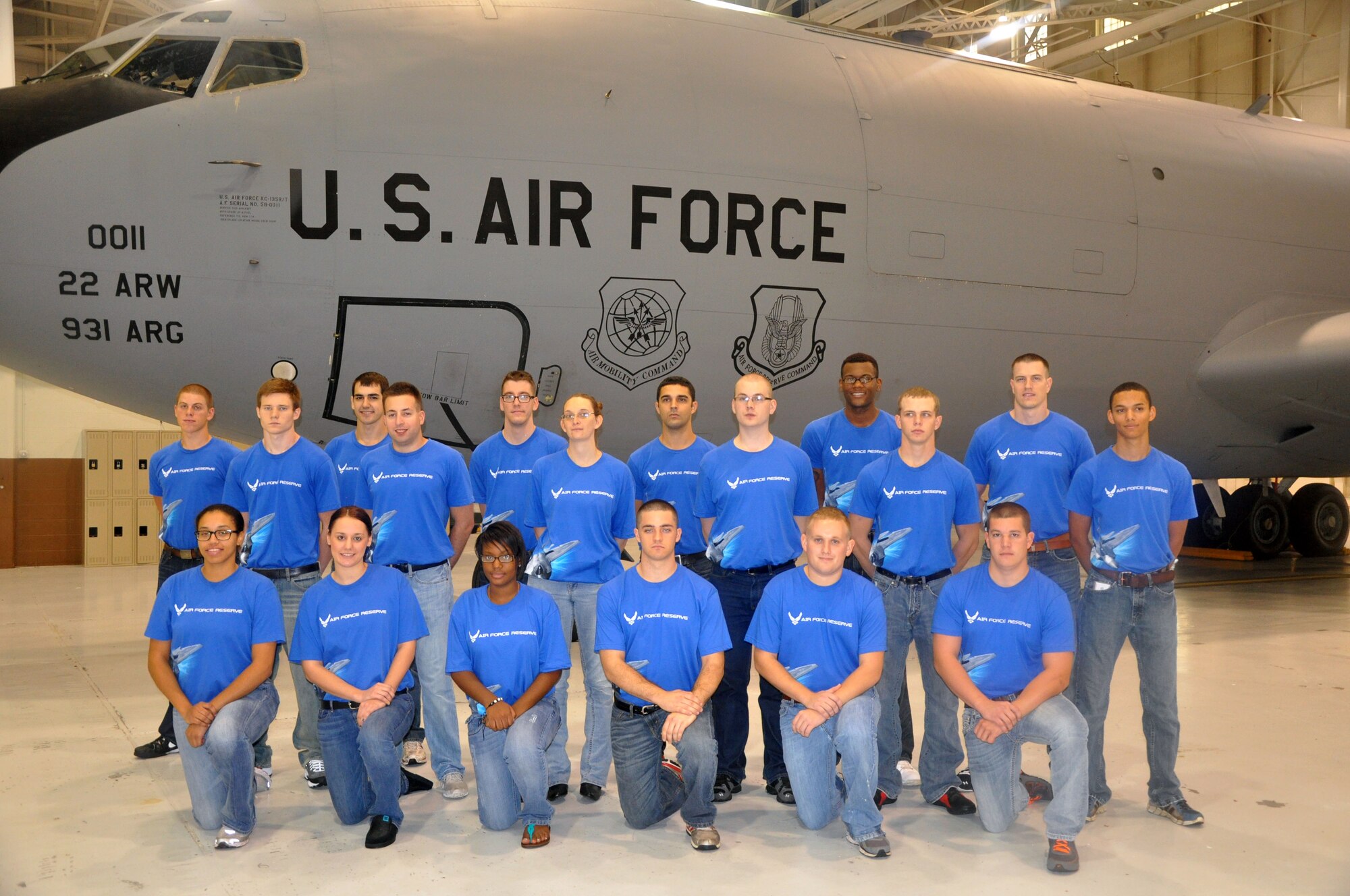 The eighteen newest members of the 931st Air Refueling Group pose in front of a KC-135 Stratotanker aircraft following a mass enlistment ceremony conducted at McConnell Air Force Base, Kan., Oct. 13, 2012.  The mass enlistment ceremony was part of the Air Force Reserve Recruiting Command's annual "Coast-to-Coast Mass Enlistment Ceremony" event.  (U.S. Air Force photo by Staff Sgt. Carrie M. Peasinger)