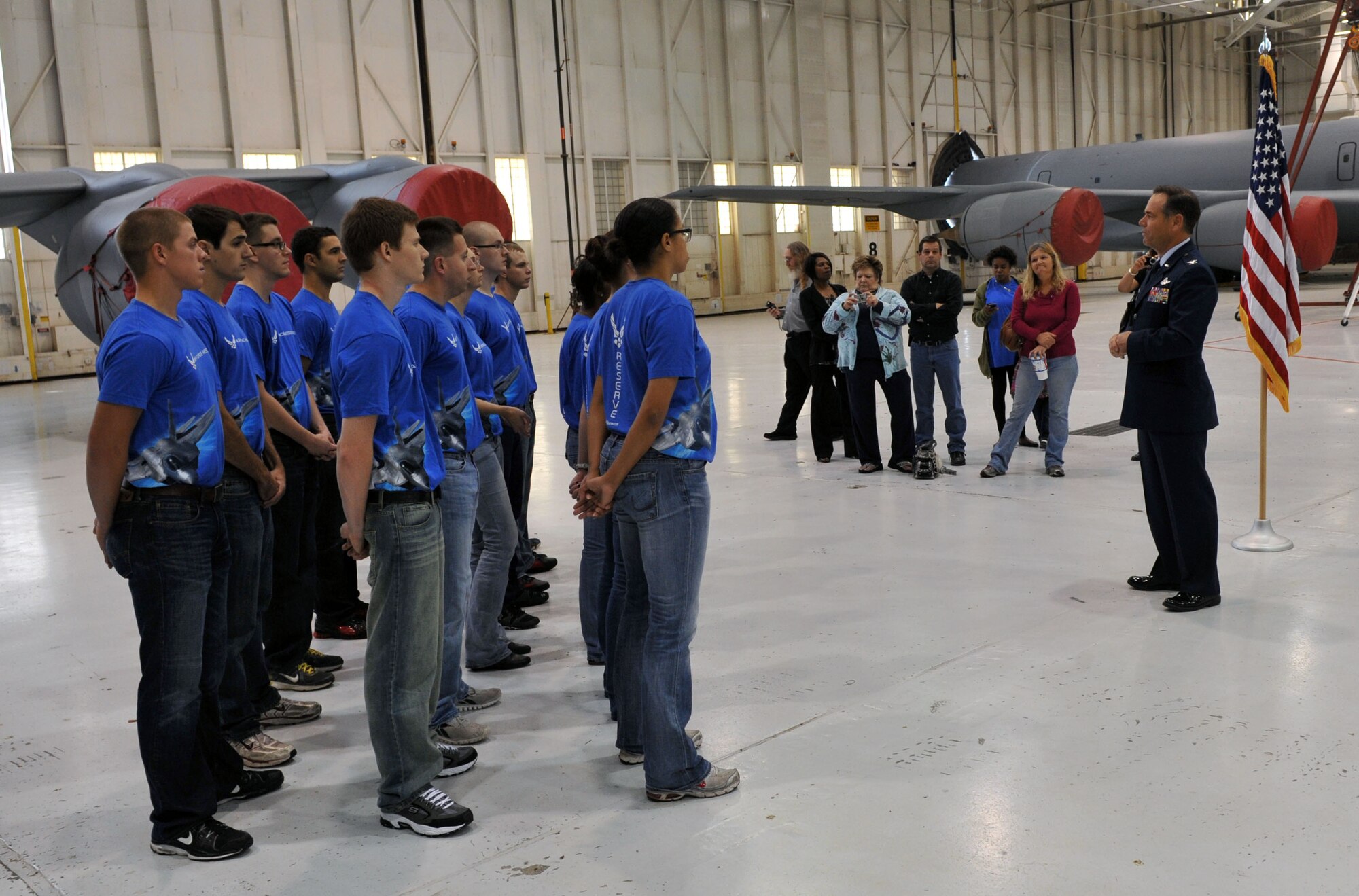 Col. Mark S. Larson, commander, 931st Air Refueling Group, speaks to 18 new recruits during a mass enlistment ceremony conducted at McConnell Air Force Base, Kan., Oct. 13, 2012.  The mass enlistment ceremony was part of the Air Force Reserve Recruiting Command's annual "Coast-to-Coast Mass Enlistment Ceremony" event.  (U.S. Air Force photo by Airman 1st Class Maurice A. Hodges)