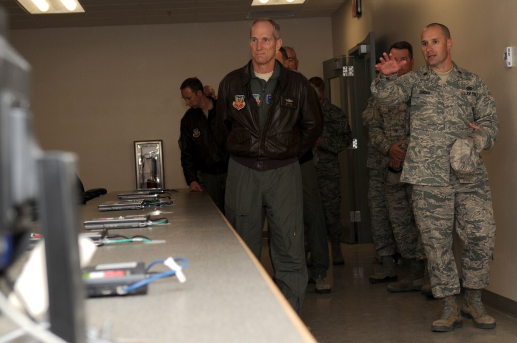 U.S. Air Force Gen. Mike Hostage, commander of Air Combat Command, is given a tour of the Installation Deployment Center by Maj. Todd Jensen, 366th Logistic Readiness Squadron commander, at Mountain Home Air Force Base, Idaho, Oct. 11, 2012. Hostage toured several facilities and discussed current issues with Airmen. (U.S. Air Force photo/Staff Sgt. Roy Lynch/RELEASED) 