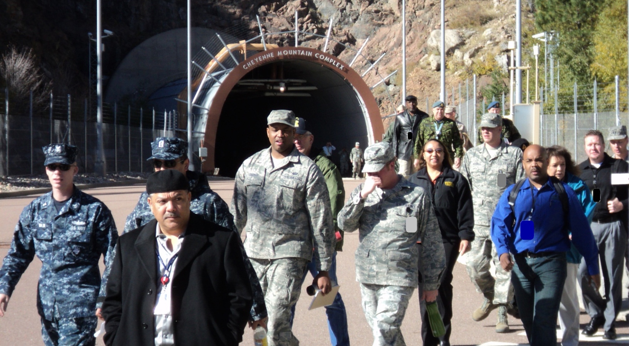 CHEYENNE MOUNTAIN AIR FORCE STATION, Colo. – The 721st Mission Support Group held an emergency evacuation drill of Cheyenne Mountain AFS on Oct. 9 as part of fire prevention week activities. The drill helps CMAFS occupants practice evacuating the complex in an orderly and safe manner, and to familiarize personnel with the most direct exit routes. (Portions of this image were masked for security.) (U.S. Air Force photo/Vincent Ferrell)