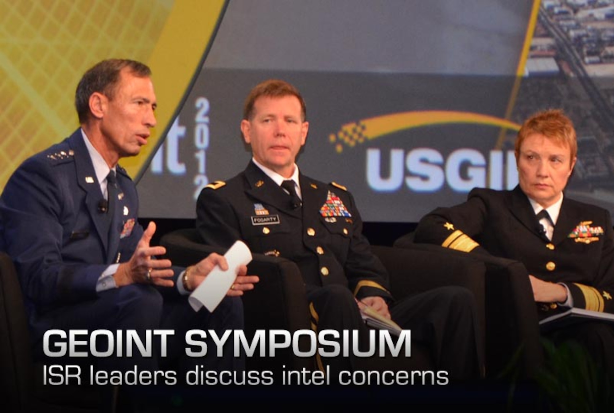 Lt. Gen. Larry James (left) addresses attendees at the 2012 GEOINT Symposium, Oct. 11 here. James, the Air Force deputy chief of Intelligence, Surveillance and Reconnaissance, was joined by Maj. Gen. Steve Fogarty (center), commanding general of U.S. Army Intelligence and Security Command; Rear Adm. Sandy Daniels (right), Senior Advisor for Space to the Deputy Chief of Naval Operations for Information Dominance and Phillip C. Chuboda (not pictured), assistant director of intelligence for the U.S. Marine Corps. (U.S. Air Force photo by Susan A. Romano)