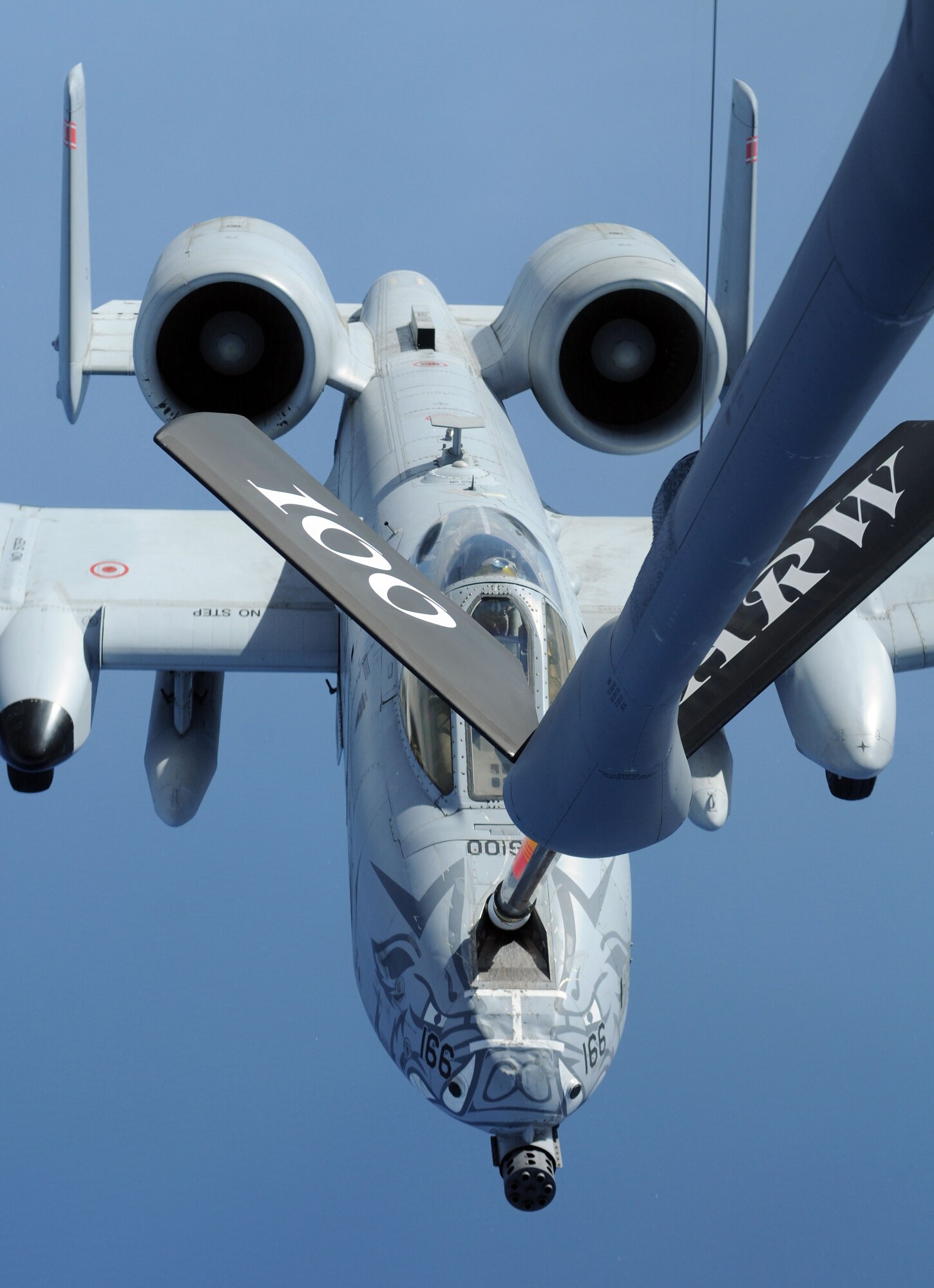 EGYPT -- An A-10 Thunderbolt II from the 188th Fighter Wing, Fort Smith, Ark., takes fuel from a KC-135 Stratotanker assigned to the 100th Air Refueling Wing, RAF Mildenhall, England, during a coronet mission Oct. 12, 2012. A coronet is when an aerial refueling tanker escorts fighters over long distances, regularly topping off their fuel tanks along the way. (U.S. Air Force photo by Staff Sgt. Austin M. May)