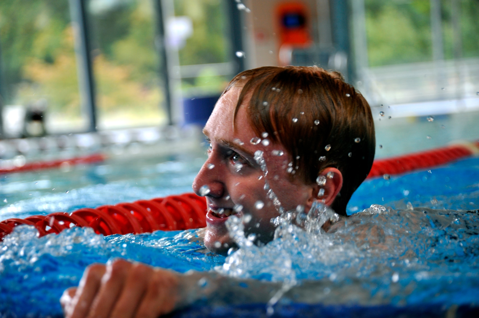 Jeremy McKinney, member of the 319th Recruiting Squadron delayed entry program, completes a 500-meter swim test at the Ramstein Aquatic Center, Ramstein Air Base, Germany, Oct. 11, 2012. McKinney is scheduled to depart for basic in Spring 2013 and, upon graduation, is slated for explosive ordnance disposal training. (U.S. Air Force photo/Senior Airman Katherine Holt)