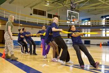 Female poolees participate in the Tug o' War portion of the all-female pool function Oct. 13. Recruiting Station Milwaukee holds quarterly pool functions specifically for its female poolees in order to prepare them for the rigors of recruit training.