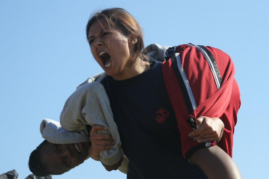 The future Marines of Recruiting Substations Columbia and Lexington, Recruiting Station Columbia, negotiate the Combat Fitness Challenge Oct. 13 at White Knoll High School in Lexington, S.C. The event tested the enlistees’ mental and physical fitness in preparation for Marine Corps Recruit Training. (Marine Corps photo by Sgt. Aaron Rooks)