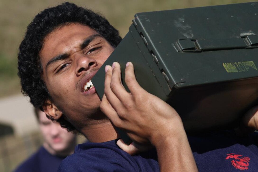 The future Marines of Recruiting Substations Columbia and Lexington, Recruiting Station Columbia, negotiate the Combat Fitness Challenge Oct. 13 at White Knoll High School in Lexington, S.C. The event tested the enlistees’ mental and physical fitness in preparation for Marine Corps Recruit Training. (Marine Corps photo by Sgt. Aaron Rooks)