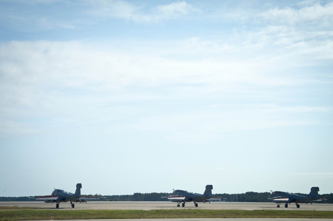 Marines with Marine Tactical Electronic Warfare Squadron 1 form up three of the squadron’s EA-6B Prowlers for takeoff on the Marine Corps Air Station Cherry Point flight line Sept. 27. The Marines, from VMAQ-1 and 4, and 6 Prowlers departed to Alaska for participation in RED FLAG-Alaska 13-1, a series of field training exercises throughout the state and western Canada until Oct. 19. The purpose is to allow for U.S. and coalition forces to provide joint offensive and counter-air interdiction, close-air support and large force employment training in a simulated combat environment.

