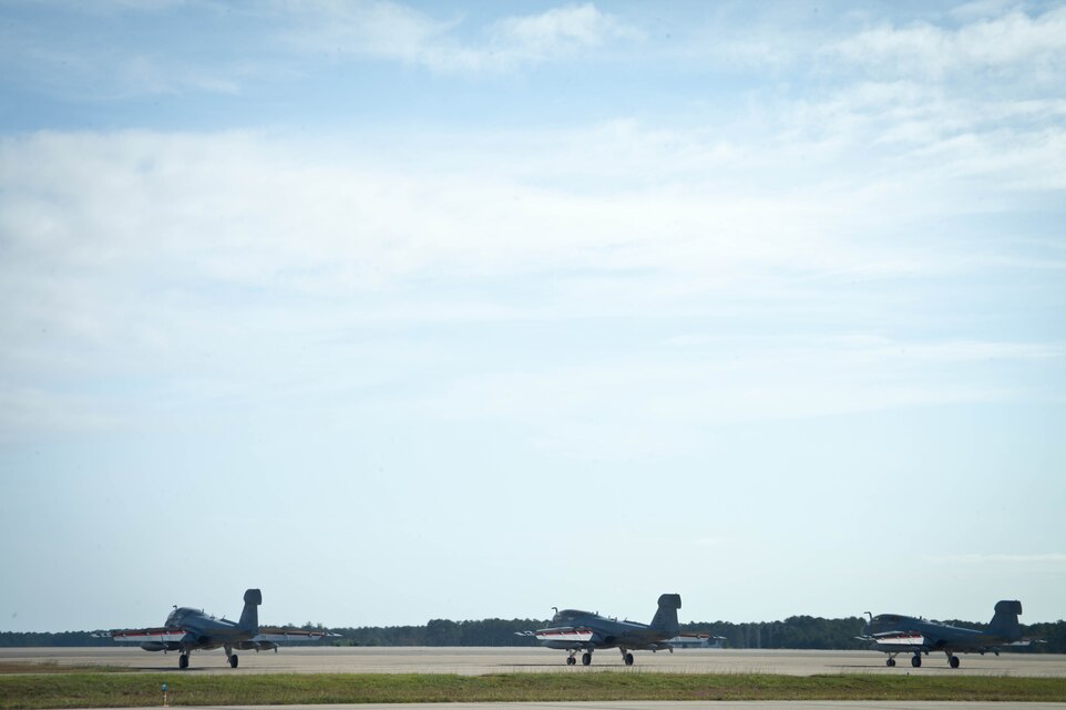 Marines with Marine Tactical Electronic Warfare Squadron 1 form up three of the squadron’s EA-6B Prowlers for takeoff on the Marine Corps Air Station Cherry Point flight line Sept. 27. The Marines, from VMAQ-1 and 4, and 6 Prowlers departed to Alaska for participation in RED FLAG-Alaska 13-1, a series of field training exercises throughout the state and western Canada until Oct. 19. The purpose is to allow for U.S. and coalition forces to provide joint offensive and counter-air interdiction, close-air support and large force employment training in a simulated combat environment.