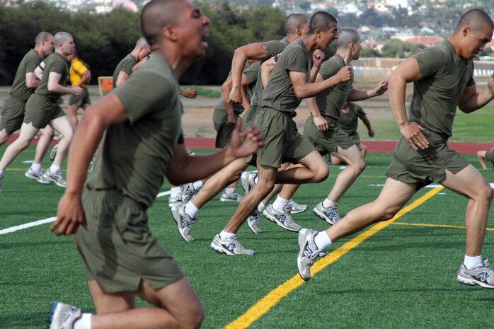 Recruits of Company E, 2nd Recruit Training Battalion, perform sprints up and down the yard lines of the football field during ability groups Oct. 11 aboard Marine Corps Recruit Depot San Diego. Ability groups has specific dynamic exercises that focus on building speed and agility in order to improve a recruit's run time.