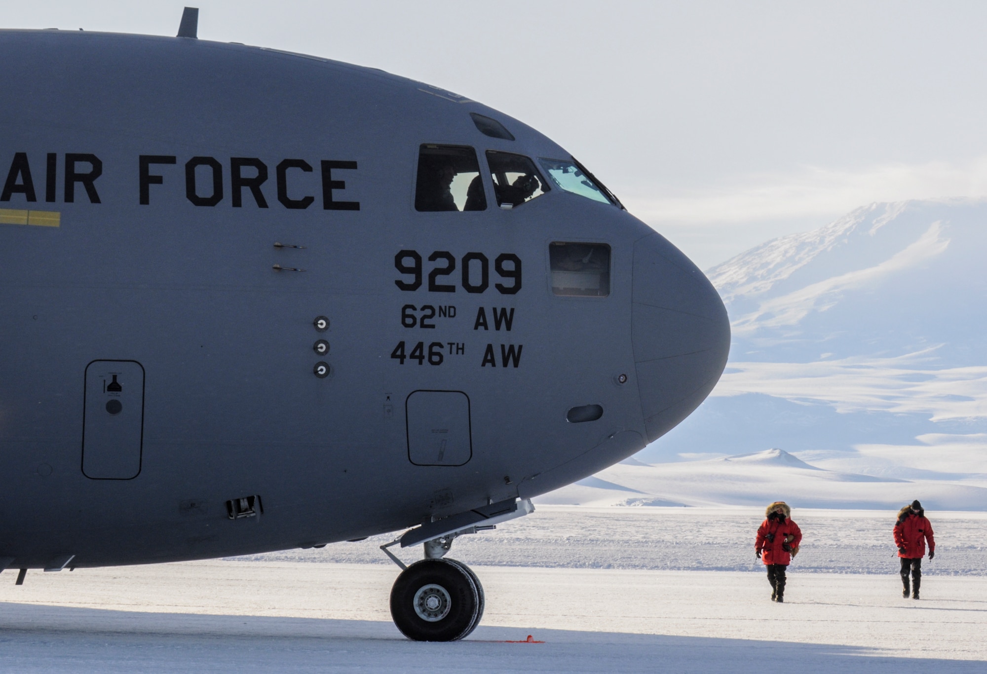 Staff Sgt. Shawn Pharr and Staff Sgt. Mathew Lee, 62nd Aircraft Maintenance Squadron flying crew chiefs, conduct an inspection of a C-17 Globemaster III aircraft, Oct. 1, 2012, on the seasonal ice runway outside of McMurdo Station, Antarctica. The crew chiefs wore Extremely Cold Weather gear to combat the chill of the minus 35 degree temperatures. (U.S. Air Force photo/Staff Sgt. Sean Tobin)
