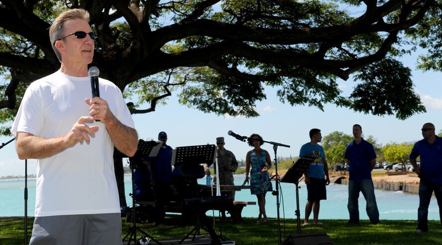 Gen. Herbert J. “Hawk” Carlisle, Pacific Air Forces commander, thanks PACAF Airmen and their families for their service and hard work throughout this year during the Mahalo Bash, at Joint Base Pearl Harbor-Hickam, Oct. 12, 2012. Mahalo Bash is an annual event hosted by the PACAF commander to show appreciation for a job well done. (U.S. Air Force photo/Tech. Sgt. Jerome S. Tayborn)
