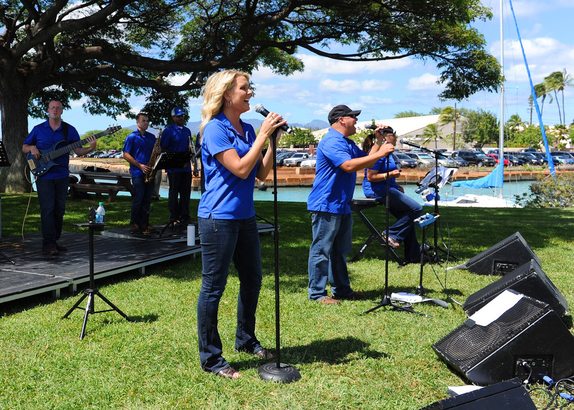 Master Sgt. Lara Murdzia, Tech. Sgt. Richard Vasquez and Tech. Sgt. Tamiko Boone, members of the U.S. Air Force Band of the Pacific-Hawaii group “Hana Hou,” sing during the Mahalo Bash, at Joint Base Pearl Harbor-Hickam, Oct. 12, 2012. The Mahalo Bash is an annual event hosted by the Pacific Air Forces commander to thank Airmen and their families for their service and hard work throughout the year. (U.S. Air Force photo/Tech. Sgt. Jerome S. Tayborn)