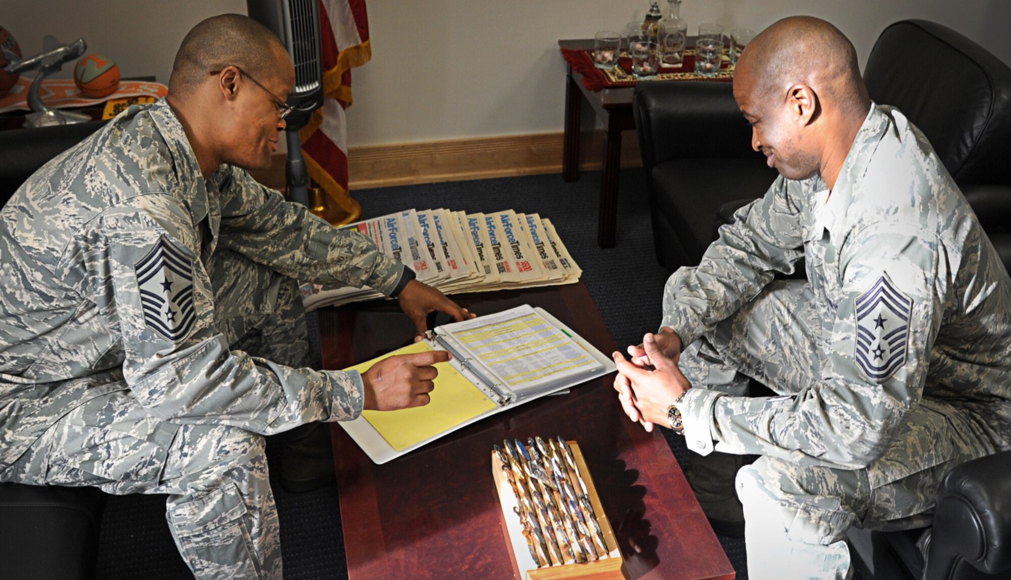 Chief Master Sgt. Jerry Moore, command chief of the 11th Air Force at Joint Base Elmendorf-Richardson, Alaska, speaks to Chief Master Sgt. Leslie Bramlett during a mentor session at Joint Base Pearl Harbor-Hickam, Hawaii, Oct. 16. As a result of the recent deactivation of 13th Air Force, the 15th Wing here and 36th Wing at Andersen AFB, Guam are now assigned to 11th Air Force. (U.S. Air Force photo/Senior Airman Lauren Main)
