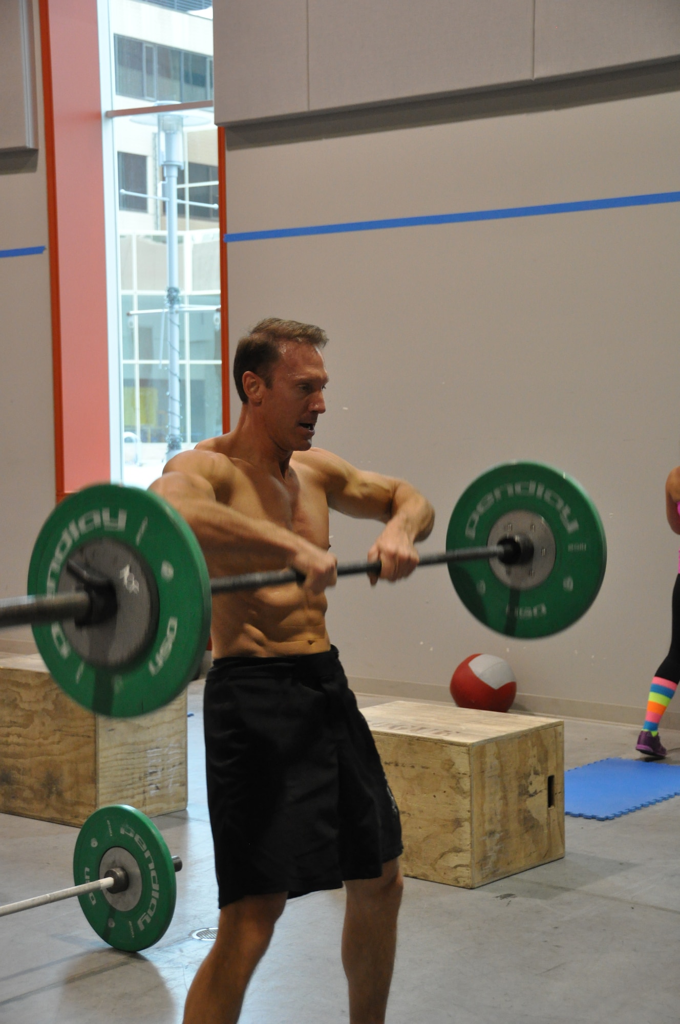 Lt. Col. David Piffarerio, 302nd FS commander, completes a sumo dead lift high pull during the 2012 CrossFit Alaska State Championships in Anchorage Oct. 13.  Piffarerio, who won first place in the over 40 male division, regularly trains at the CrossFit gym at Hangar 5 on JBER. (U.S. Air Force Reserve/Tech. Sgt. Dana Rosso)