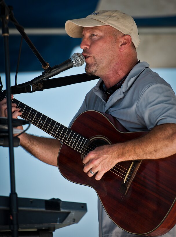Steve Hall performed live music for the crowd at Duke Field’s Family Day event Oct. 13.  The 919th Special Operations Wing sets aside a special day each year to show appreciation for its reservists and their family members.  Events include food, music, sports, children’s games, etc.  (U.S. Air Force photo/Tech. Sgt. Samuel King Jr.)