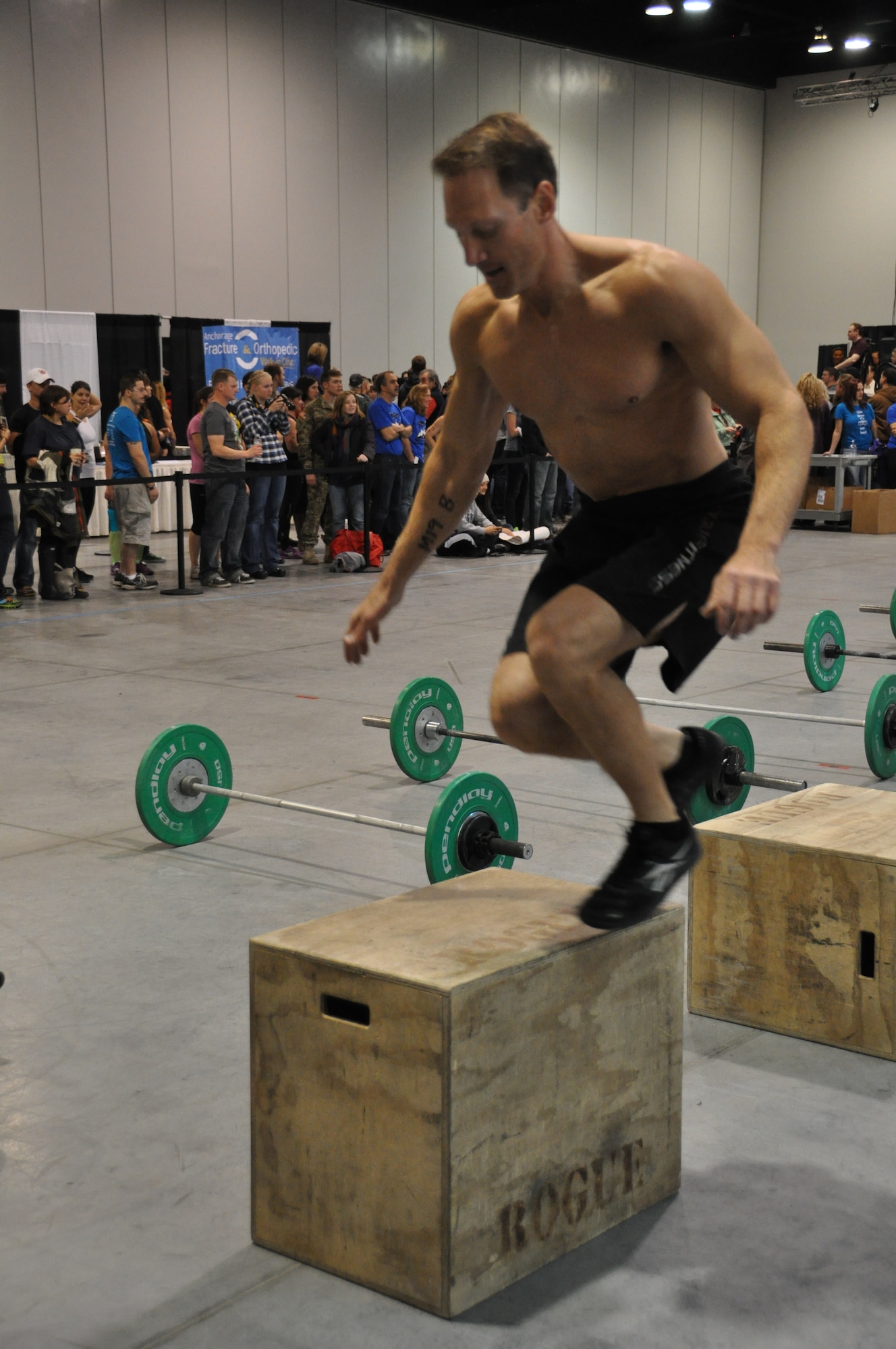 Lt. Col. David Piffarerio, 302nd FS commander, completes a lateral box jump during the 2012 CrossFit Alaska State Championships in Anchorage Oct. 13.  “The interesting thing about CrossFit is there isn't a ‘typical’ workout,” said Piffarerio.  “Every day is something new and challenging.  You can see workouts range from five minutes up to an hour, with combinations of metabolic conditioning, weightlifting and body weight movements all in the mix.” Piffarerio won first place in the over 40 male division.  (U.S. Air Force Reserve/Tech. Sgt. Dana Rosso)