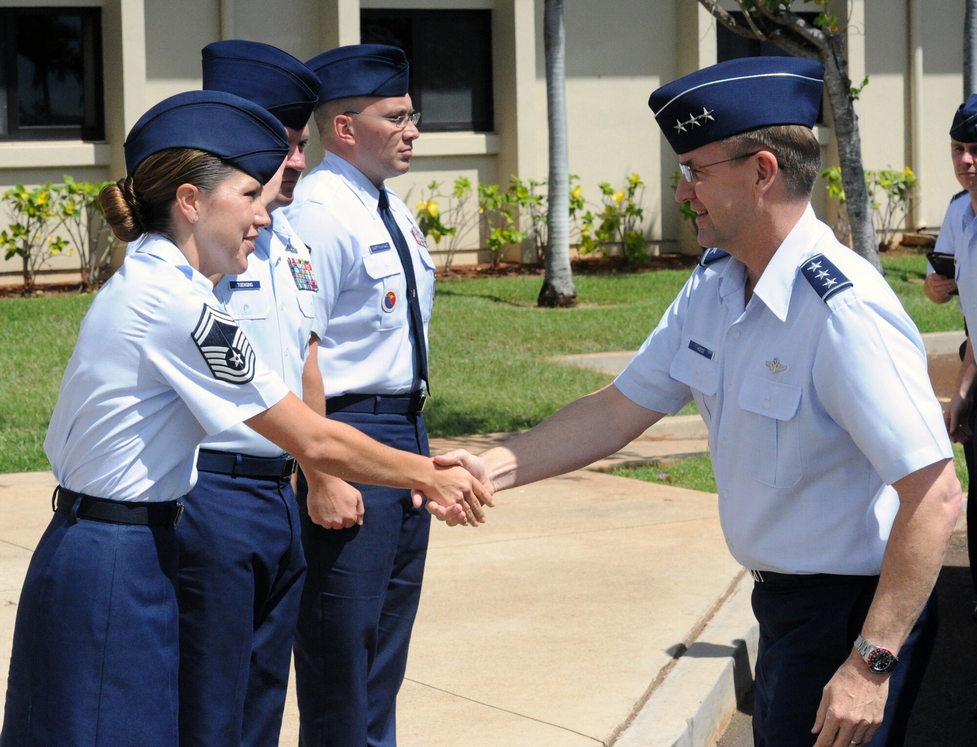 Lt. Gen. Stephen Hoog, commander of 11th Air Force at Joint Base Elmendorf-Richardson, Alaska, is greeted by personnel from the Hickam Professional Military Education center Oct. 15 during a visit to Joint Base Pearl Harbor-Hickam, Hawaii. As a result of the recent deactivation of 13th Air Force, the 15th Wing here and 36th Wing at Andersen AFB, Guam are now assigned to 11th Air Force. (U.S. Air Force photo by Staff Sgt. Nathan Allen)
