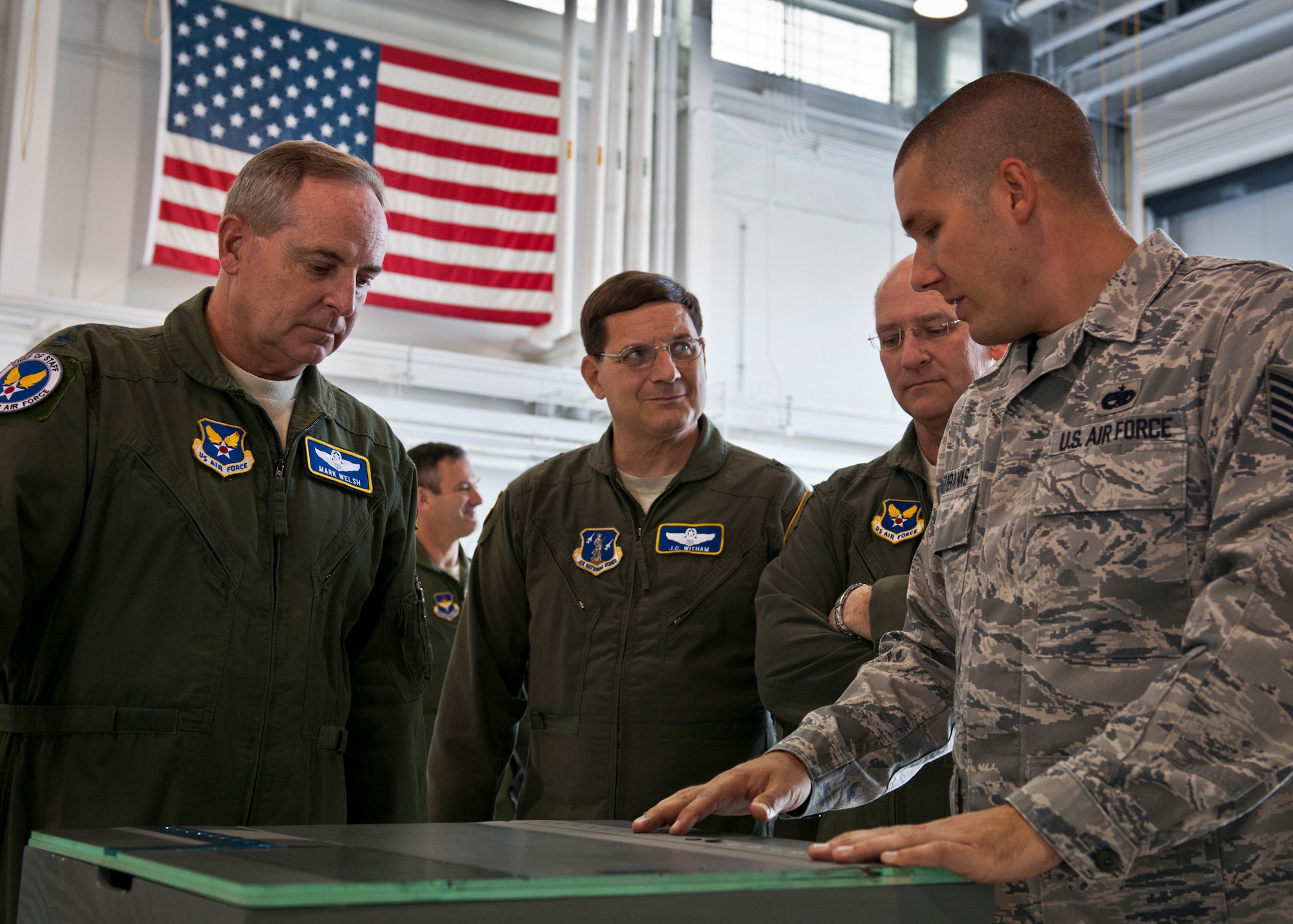 Tech. Sgt. Manley Eubanks, of the 33rd Maintenance Squadron, briefs Air Force Chief of Staff Gen. Mark A. Welsh III on the panels of the F-35A Lightning II during the general’s visit to the 33rd Fighter Wing at Eglin Air Force Base, Fla., Oct. 16.  The 33rd Fighter Wing's unique environment is comprised of military, civilians and contractors at Eglin, who will train pilots and maintainers for all three variants of the F-35 for the Air Force, Navy and Marines. (U.S. Air Force photo/Samuel King Jr.)