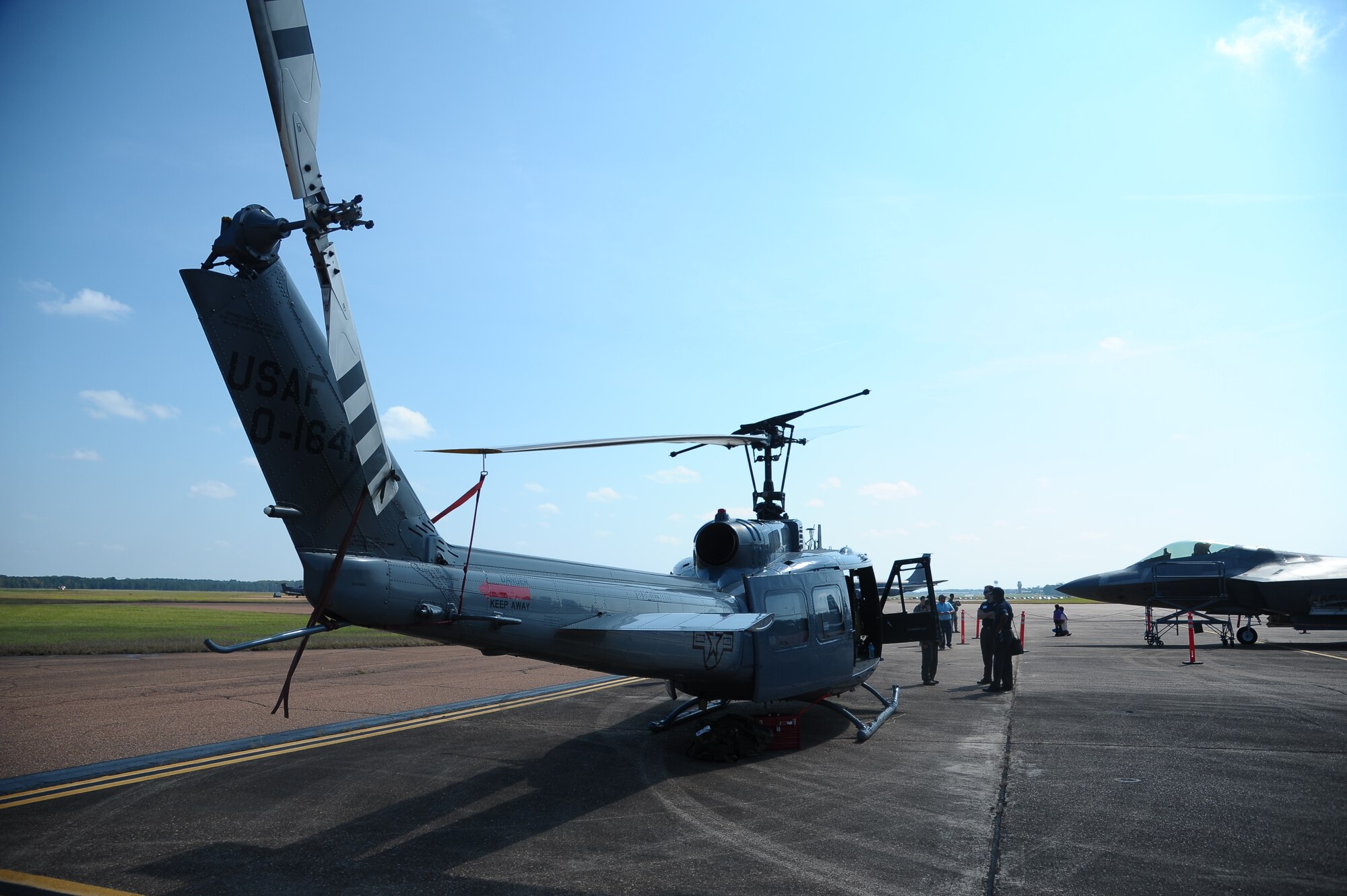 A TH-1H from Fort Rucker, Ala. awaits pilots interesting in learning the fundamentals of the aircraft during Career Day at Columbus Air Force Base Oct. 13 on the flight line.  Career Day is a day in which aircraft from bases around the country fly in to give future pilots a better perspective of their potential careers.  (U.S. Air Force Photo/Airman 1st Class Charles Dickens)