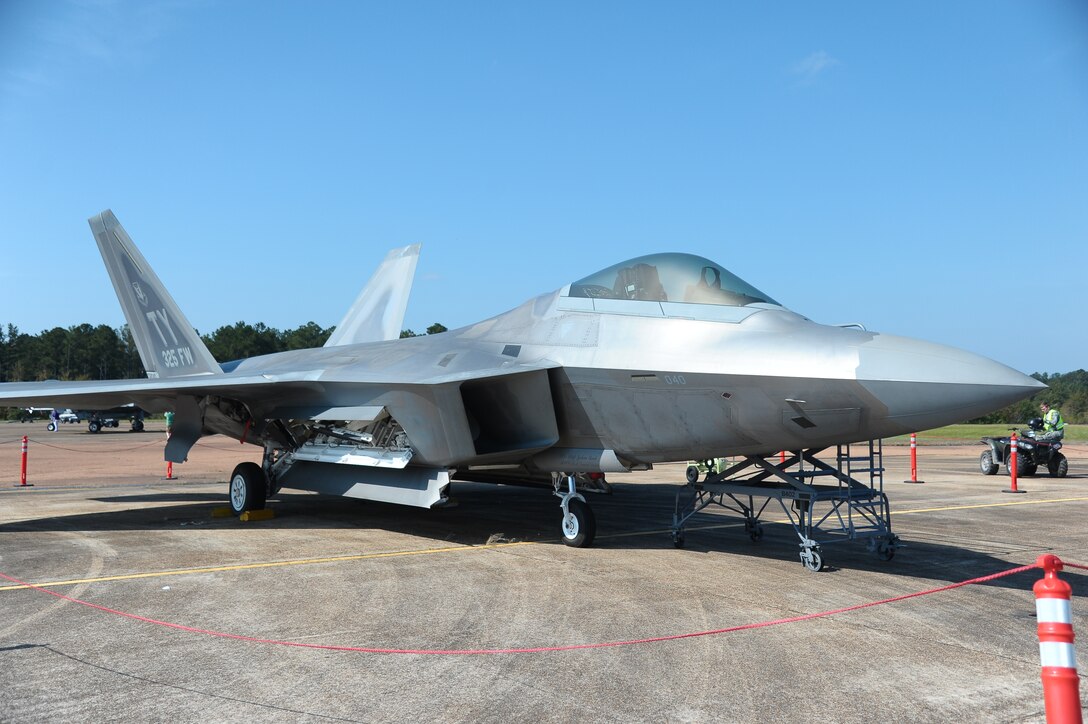 An F-22 from Tyndall Air Force Base, Fla. awaits pilots interesting in learning the fundamentals of the aircraft during Career Day at Columbus Air Force Base Oct. 13 on the flight line.  Career Day is a day in which aircraft from bases around the country fly in to give future pilots a better perspective of their potential careers.  (U.S. Air Force Photo/Airman 1st Class Charles Dickens)