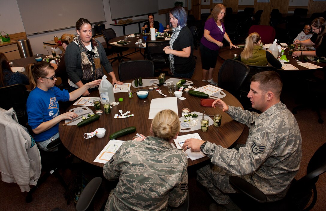 Airmen and family members of all ages participated in a food canning workshop at the Airman and Family Readiness Center on Ellsworth Air Force Base, S.D., Oct. 11, 2012. This was the first such event hosted by the A&FRC. For more information on upcoming classes, call the A&FRC at (605) 385-4663. (U.S. Air Force photo by Airmen 1st Class Kate Thornton-Maurer/Released) 