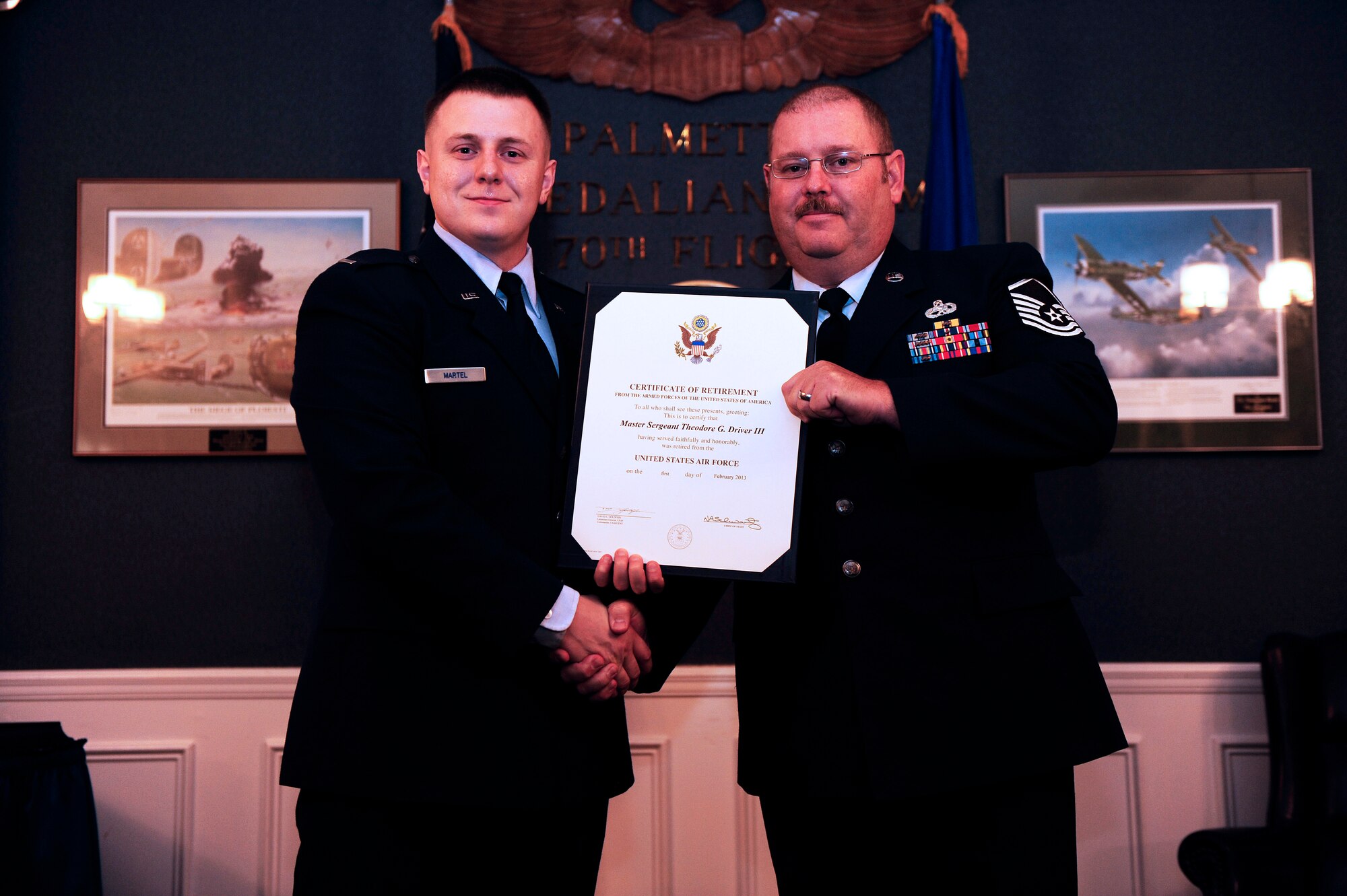 Master Sgt. Theodore Driver accepts his retirement certificate at Shaw Air Force Base, S.C., Oct. 12, 2012. Driver retired as a master sergeant after many years of faithful service to the Air Force. (U.S. Air Force photo by Airman 1st Class Daniel Blackwell/Released)