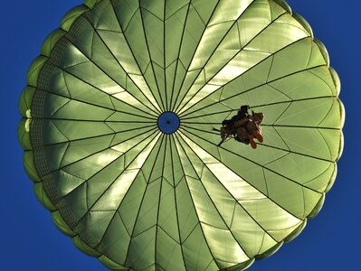 A U.S. Army Paratrooper from the 82nd Airborne Division, Fort Bragg, N.C., participates in a personnel drop during Large Package Week that happens in conjunction with Joint Operational Access Exercise, Oct. 11, 2012. LPW is an exercise that utilizes several Air Force aircraft to strategically airdrop troops and cargo. (U.S. Air Force photo/ Staff Sgt. Elizabeth Rissmiller)