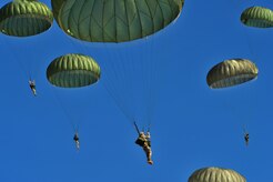 Army paratroopers from the 82nd Airborne Division, Fort Bragg, N.C., participate in a personnel drop during Large Package Week that happens in conjunction with Joint Operational Access Exercise Oct. 11, 2012. LPW is an exercise that utilizes several Air Force aircraft to strategically airdrop troops and cargo. (U.S. Air Force photo/Staff Sgt. Elizabeth Rissmiller) 


