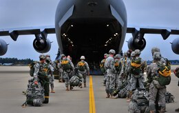 Army Soldiers from the 82nd Airborne Division, Fort Bragg, N.C., board a C-17A Globemaster III prior to a personnel drop during Joint Operational Access Exercise, Oct. 9, 2012. JOAX is a two-week exercise to prepare Air Force and Army service members to respond to worldwide crisis and contingencies. (U.S. Air Force photo/Staff Sgt. Elizabeth Rissmiller) 

