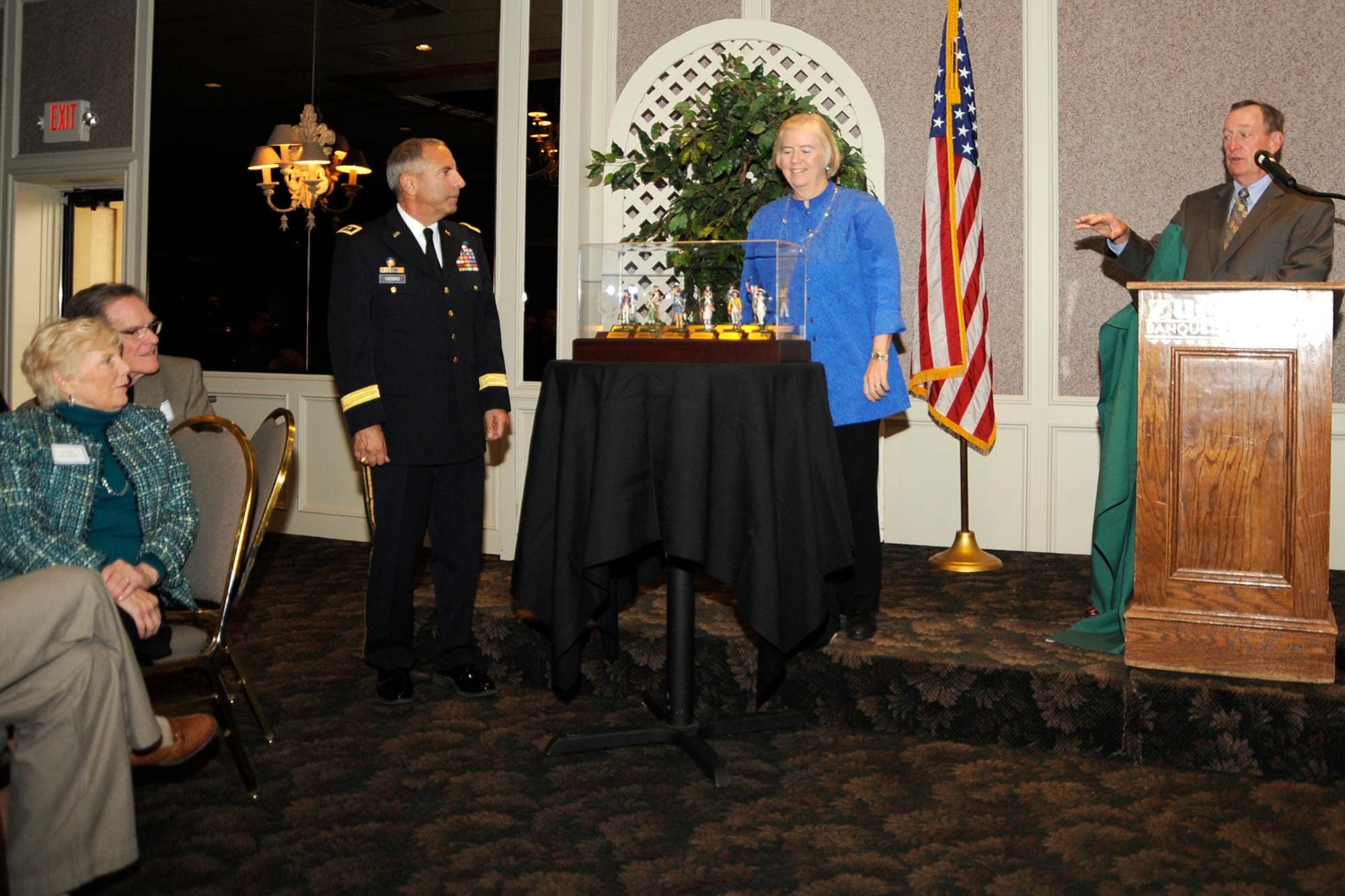 U.S. Representative Candice Miller was presented the Harry S. Truman Award at the Selfridge Base Community Council luncheon on October 16, 2012, by retired Major General Gus Hargett, National Guard Association of the United States’ president (right).  “She has been a true stalwart for the Guard…she’s not about words, she’s about action,” said Hargett of Rep. Miller.  Michigan Adjutant General Major General Gregory Vadnais (left) was on hand to thank the congresswoman for her continuous support of Michigan National Guardsmen.  