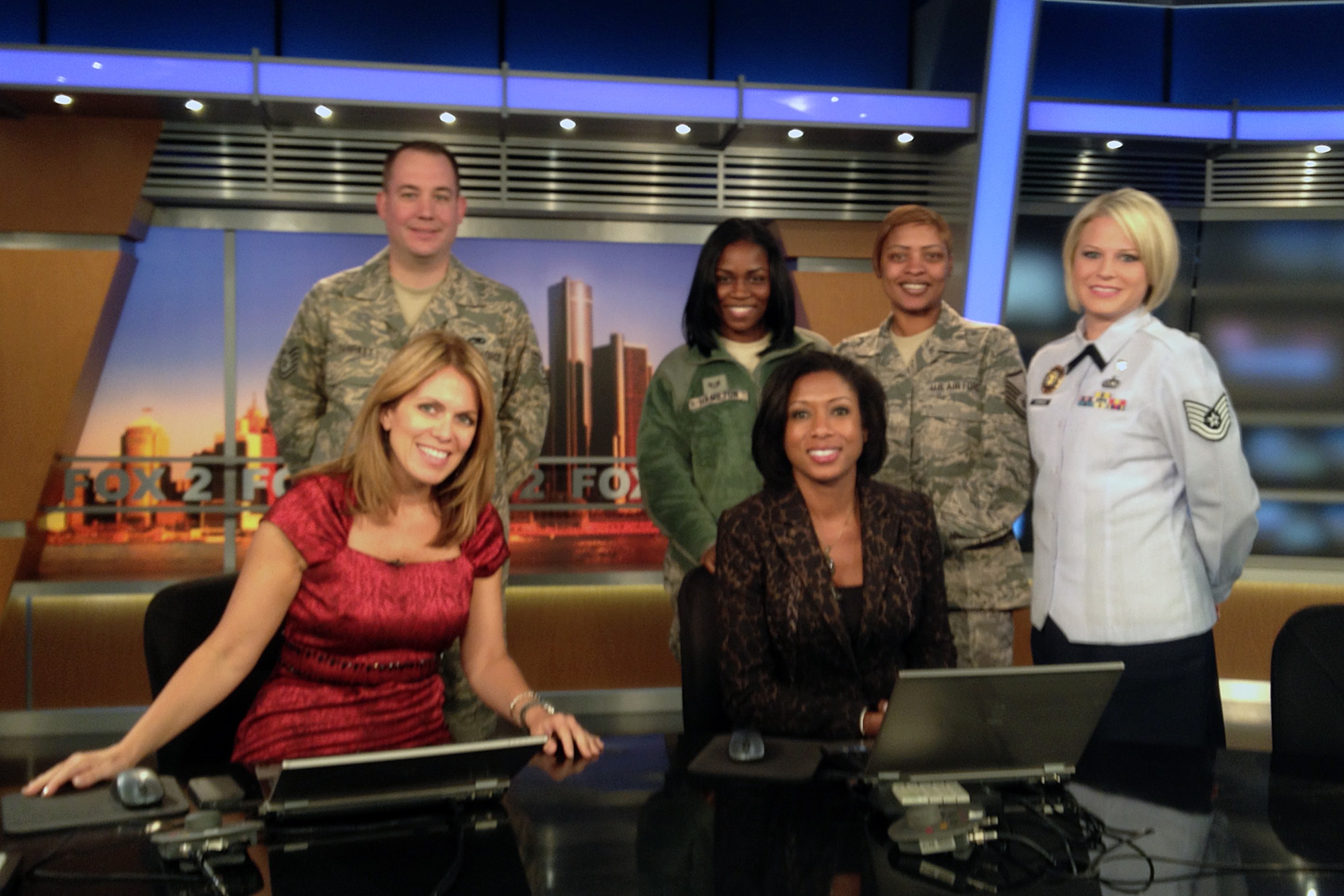 Several members of the 127th Wing Recruiting office at Selfridge Air National Guard Base visited the studios of Fox-2 Detroit on Oct. 16, 2012, to talk about job opportunities that exist in the Air National Guard at Selfridge. With Fox-2 reporters Deena Centofanti and Anqunette Jamison are TSgt. Kevin Shirkey, SSgt. Daquita Hamilton, MSgt. Rebecca El and TSgt. Chandra Corrado, who was interviewed during a live segment about the opportunities that exist in the ANG. (Courtesy photo from Fox-2)