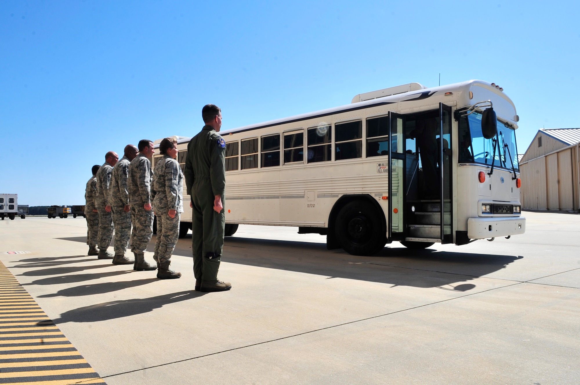 U.S. Air Force commanders from Shaw Air Force Base stand at attention and wait to welcome U.S. Air Force retired general officers during the Tri-State Leadership Forum, Shaw Air Force Base, S.C., Oct. 11, 2012.  The retired generals gathered at the Carolina Skies Club and Conference Center for a series of presentations, visited hangar 1200 to view demonstrations and interact with 20th Fighter Wing personnel, and also participated in a driving tour of the base. (U.S. Air Force photo by Airman Nicole Sikorski/Released)

